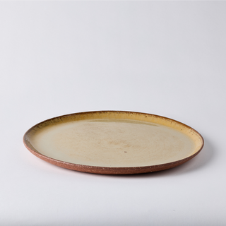 Round ceramic platter - earthy, soft honey