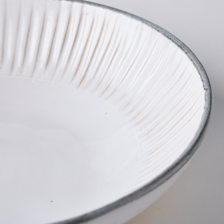 Natural vanilla white ceramic ridged fruit bowl, with quarry grey edge