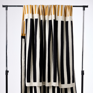 Monochrome black, cream and ochre cotton throw - linear design