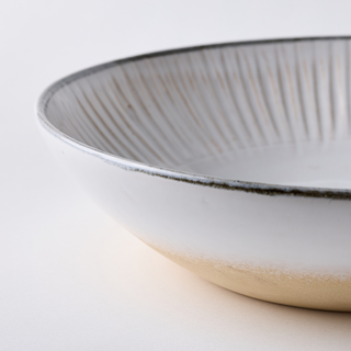 Natural vanilla white ceramic ridged fruit bowl, with quarry grey edge