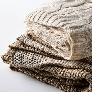 Cable knit cotton throw - pale natural cotton colour