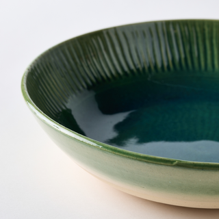 Mottled marine green ceramic ridged fruit bowl